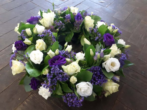 white and purple wreath